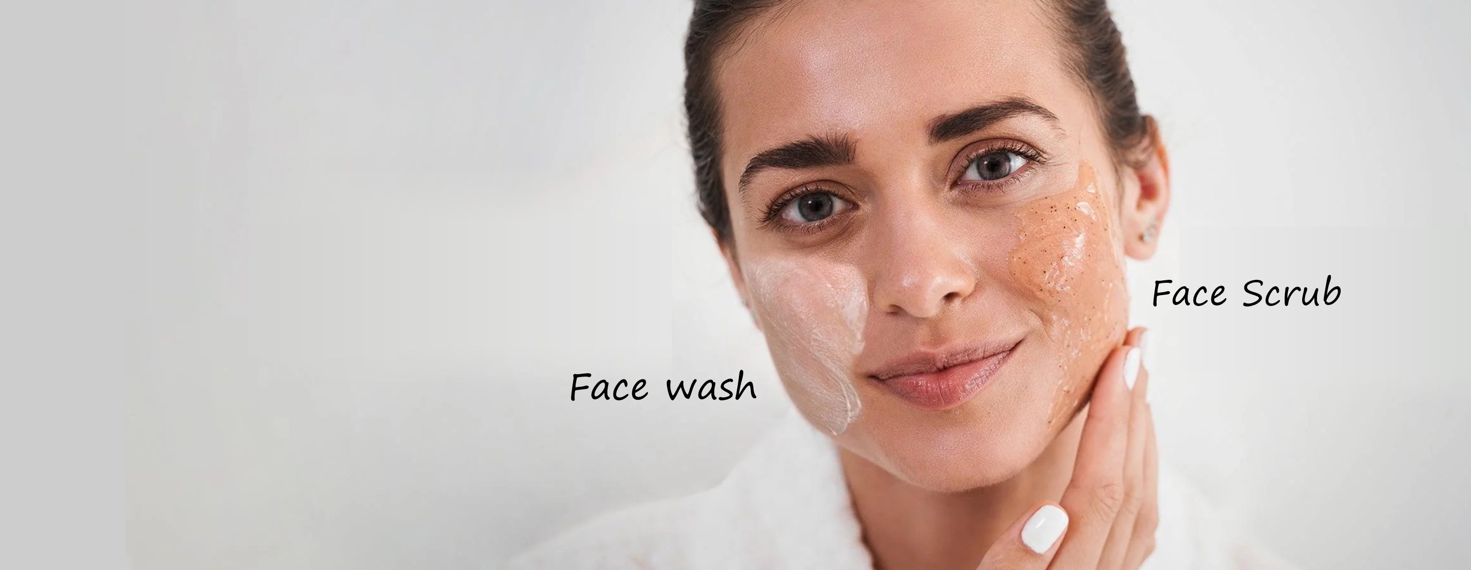 Woman applying face scrub to her cheeks while holding a skincare product, representing the difference between face wash and face scrub for healthy glowing skin.